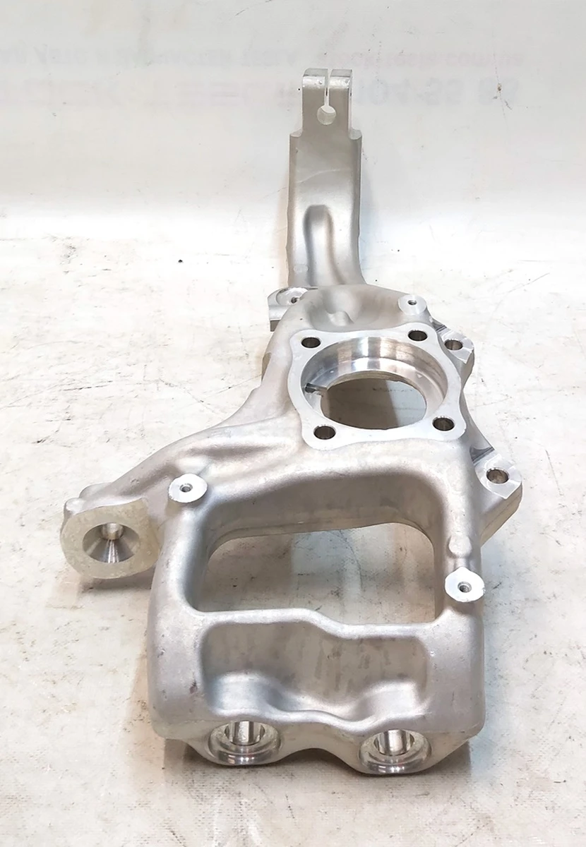 1 Кулак поворотный передний левый Tesla model X 1027311-00-F