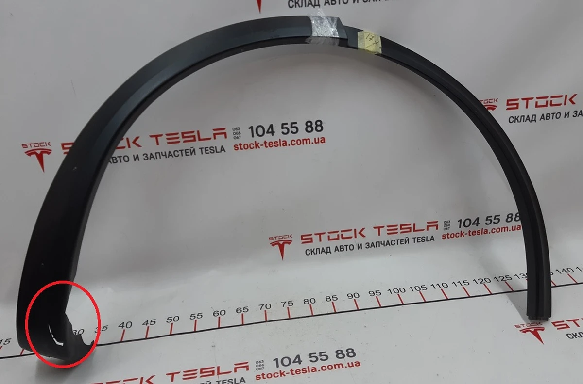 7 Fender pad rear right plastic damaged Tesla model X 1035291-00-G