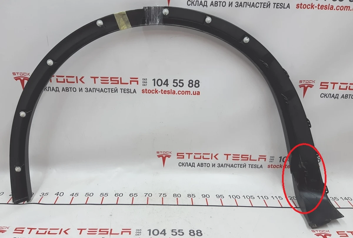 7 Fender pad rear right plastic damaged Tesla model X 1035291-00-G