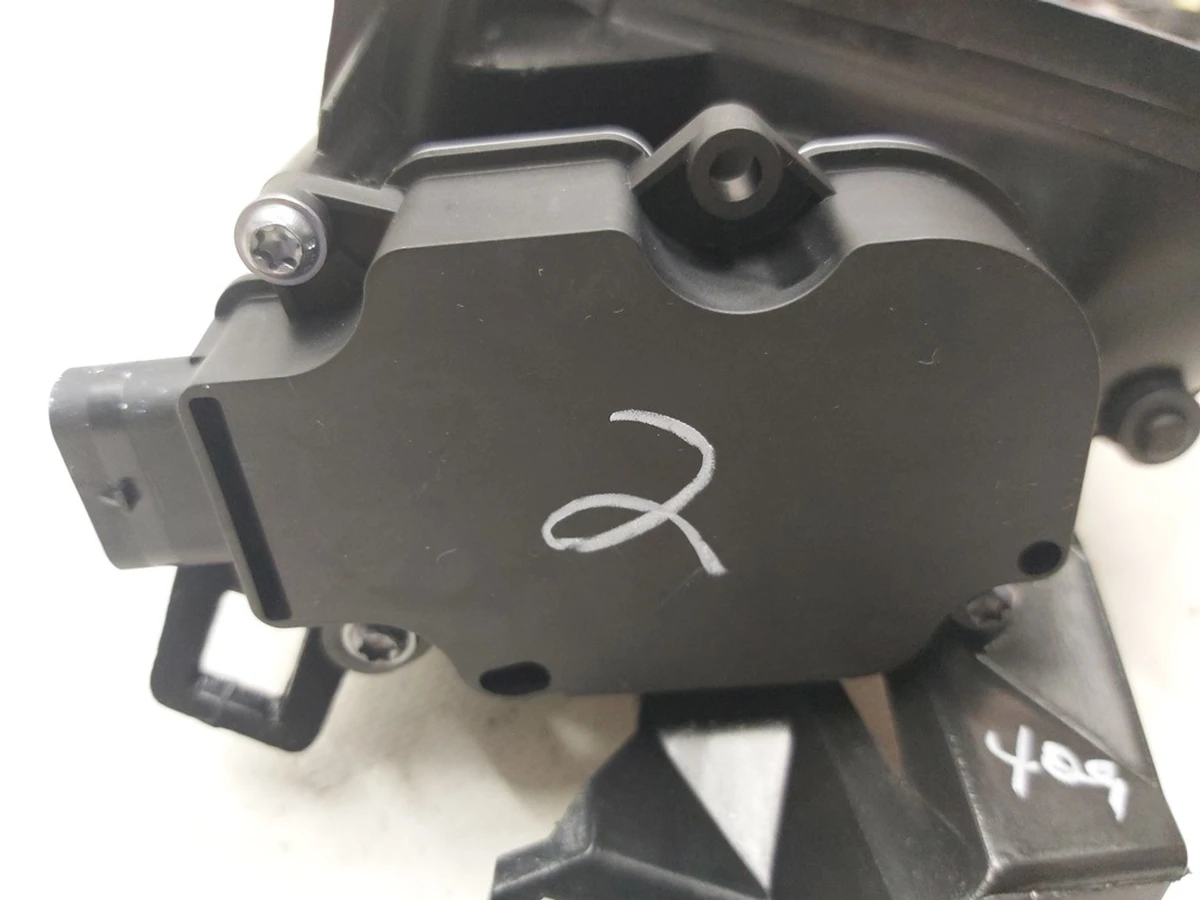 18 Active eyelet housing, right, complete with NEW Tesla model S REST module 1058007-00-J