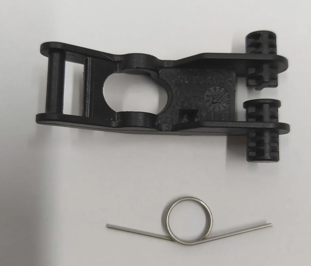 7 Lever for emergency (manual) opening of the Tesla model S hood lock actuator REST 1061816-00-E