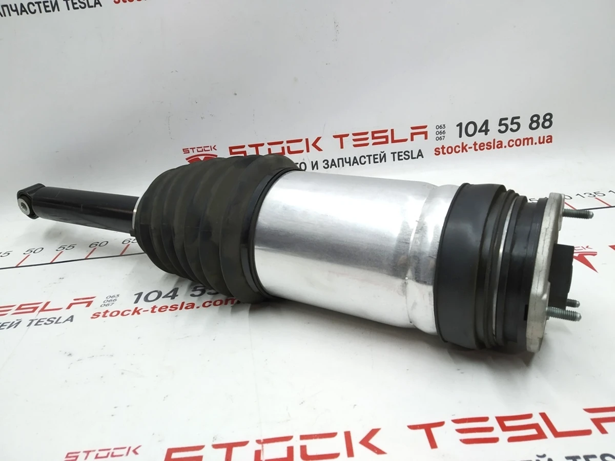 1 Right rear pneumatic module with damaged silent block AWD Tesla model S REST 1067466-25-C
