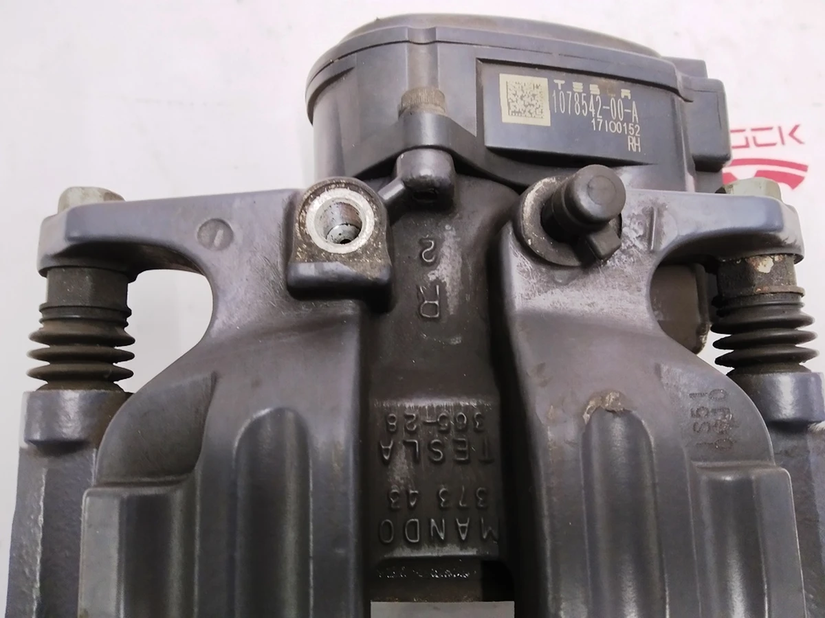 1 Суппорт тормозной задний правый MANDO (с тормозными колодками) Tesla model S REST, Tesla model X 1078542-00-B