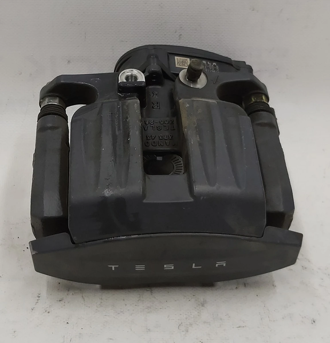 1 Суппорт тормозной задний правый MANDO (без тормозных колодок) Tesla model S REST, Tesla model X 1078542-00-B