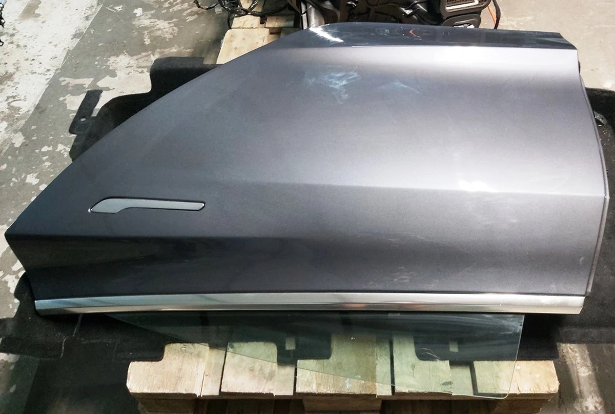 7 Двері задні ліві в зборі PMNG Tesla model 3 1081441-E0-C
