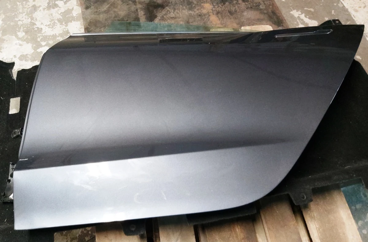 7 Двері задні ліві в зборі PMNG Tesla model 3 1081441-E0-C