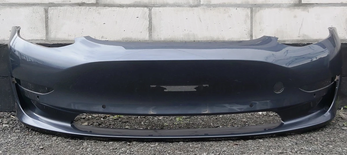 1 Бампер передній MIDNIGHT SILVER METALLIC-PMNG у зборі з кронштейнами парктроніків, протитуманних фар та підкрилок Tesla model 3 1084168-S4-E