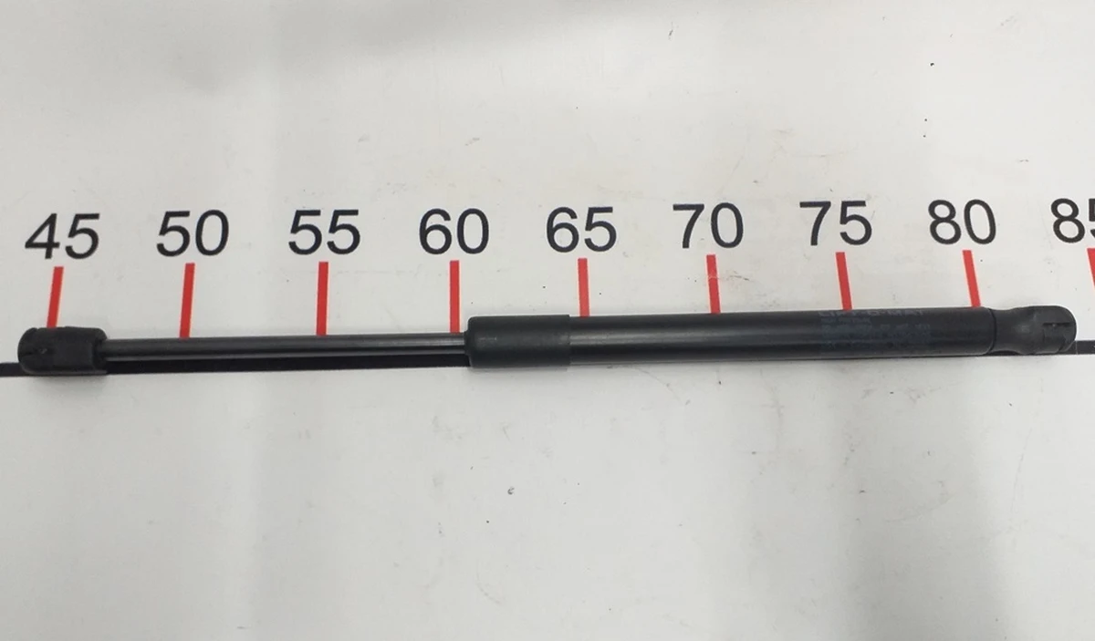 3 Амортизатор (упор газовий) капота лівий правий Tesla Model 3 1091472-00-B