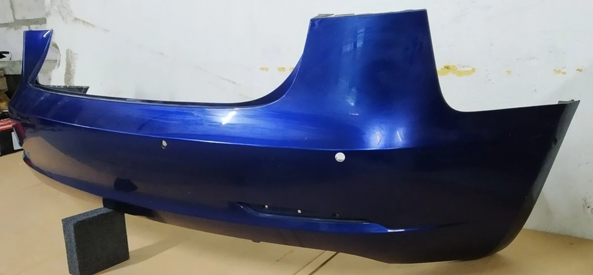 1 Бампер задний под 6 парктроников в сборе с кронштейнами крепления парктроников DEEP BLUE METALLIC-PPSB (мелкие царапины) Tesla model 3 1108905-S5-A