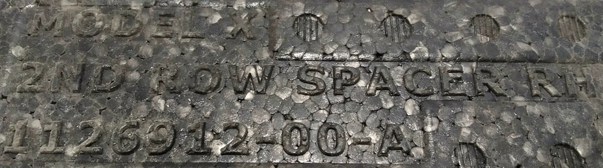 8 2nd Row spacer RH Tesla Model X 1126912-00-A