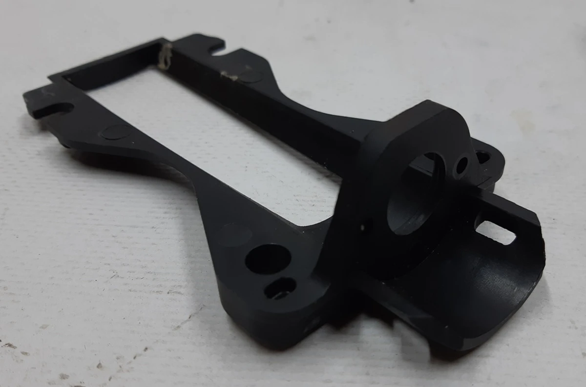 Bracket for fastening the electric motor of the handle mechanism of the outer front right GEN 1.0 Telsa model S 1135725-S0-A