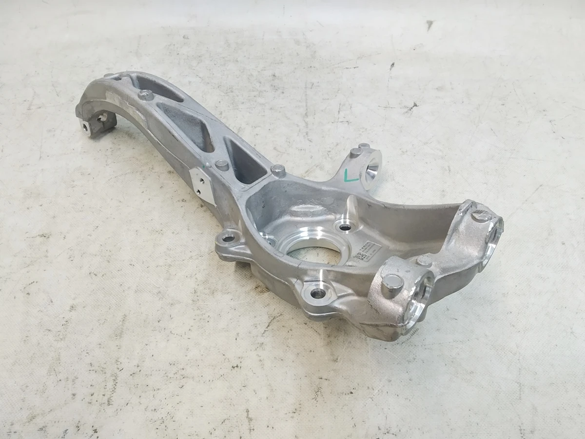 1 Кулак поворотний передній лівий (Цапфа) Tesla Model Y 1188311-00-E