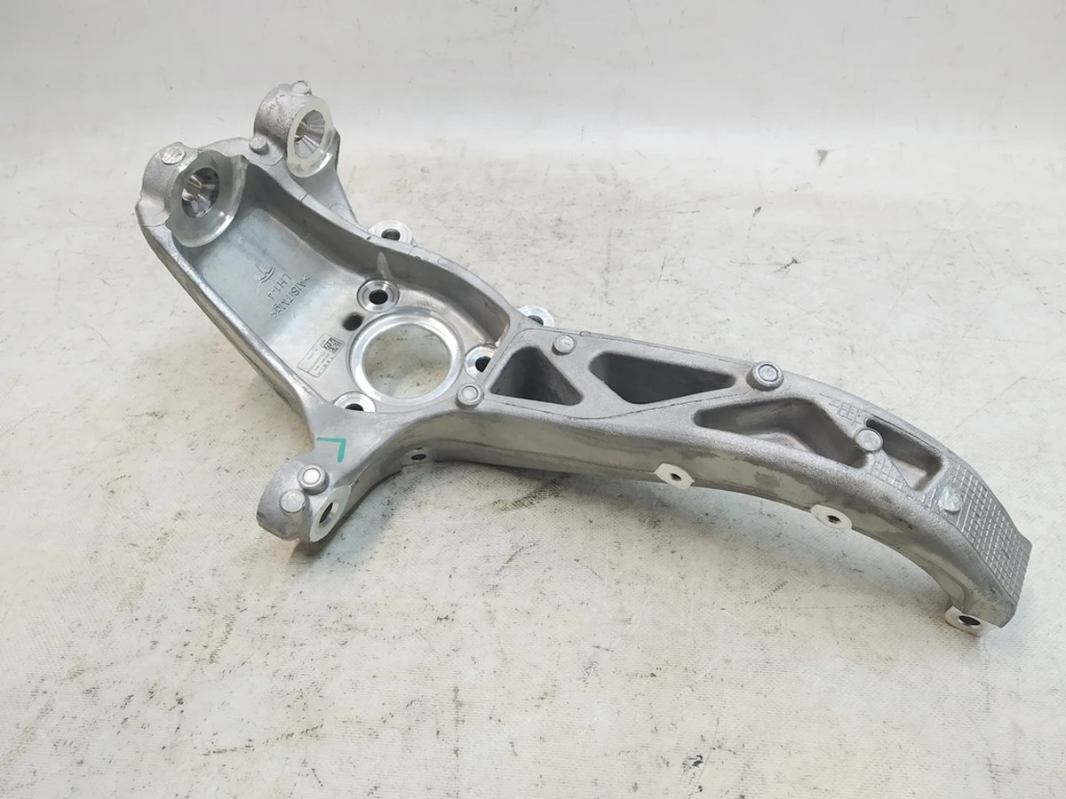 1 Кулак поворотний передній лівий (Цапфа) Tesla Model Y 1188311-00-E