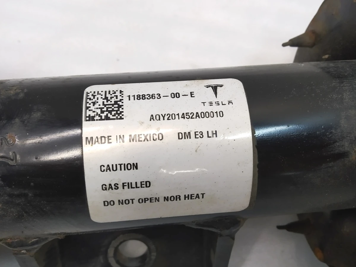 1 Damper assembly coil E3 - Dual motor - Front Left Hand Tesla Model Y 1188363-00-F