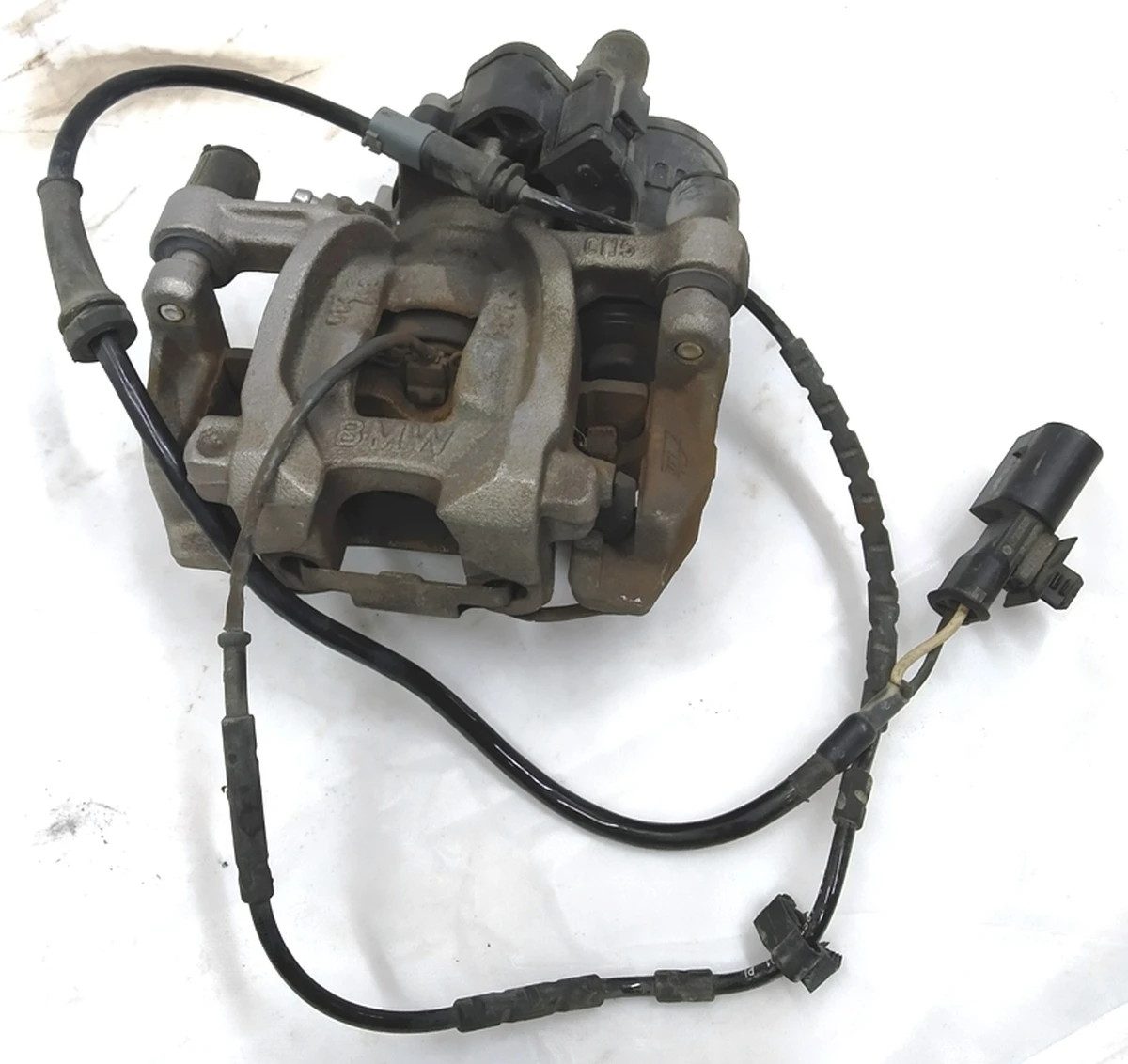 Супорт гальмівний задній правий в зборі з направляючою колодками супортом стоянкового гальма BMW i3 34216860005