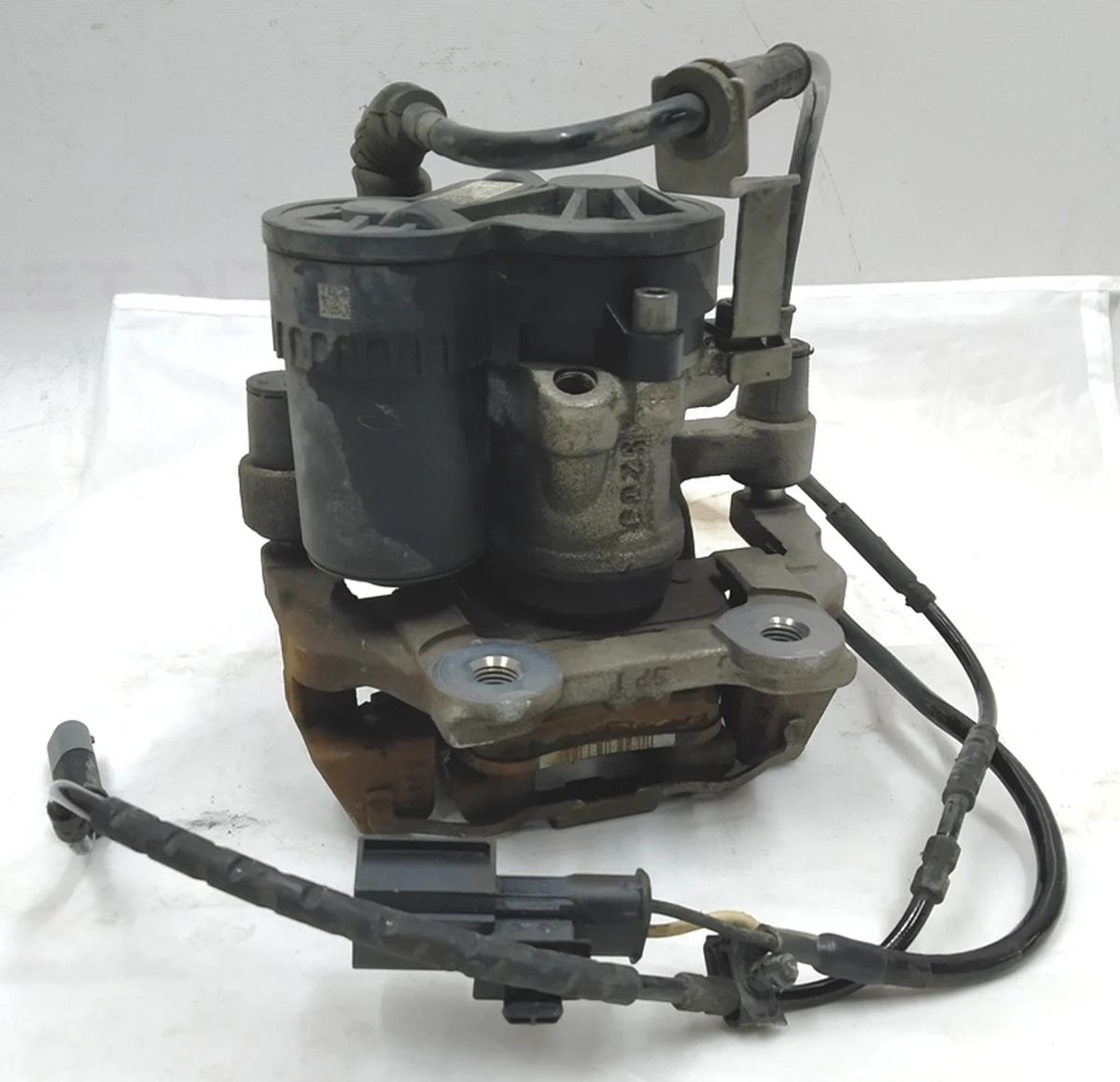 Супорт гальмівний задній правий в зборі з направляючою колодками супортом стоянкового гальма BMW i3 34216860005