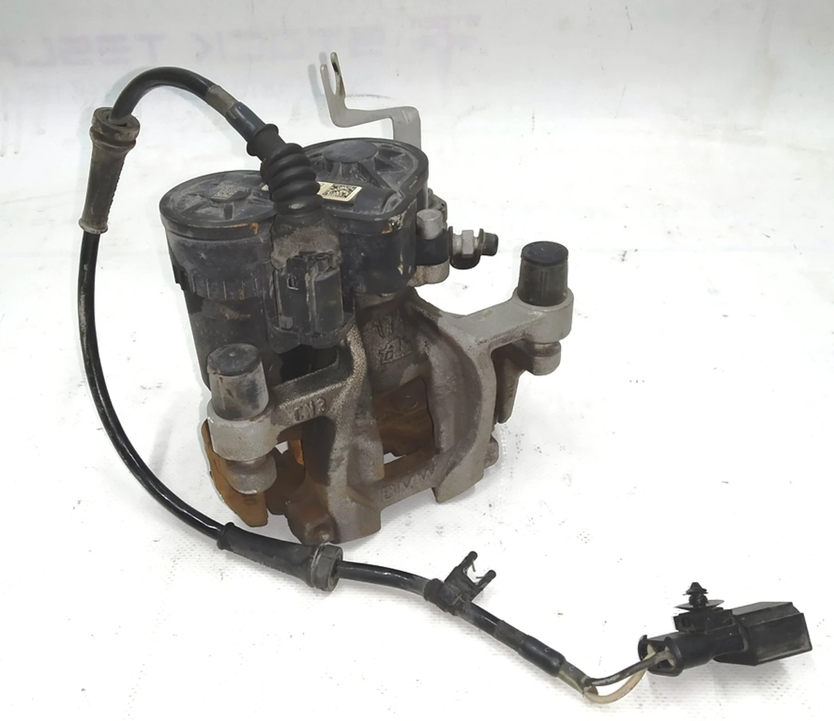 Супорт гальмівний задній лівий в зборі з направляючою колодками супортом стоянкового гальма BMW i3 34216860006