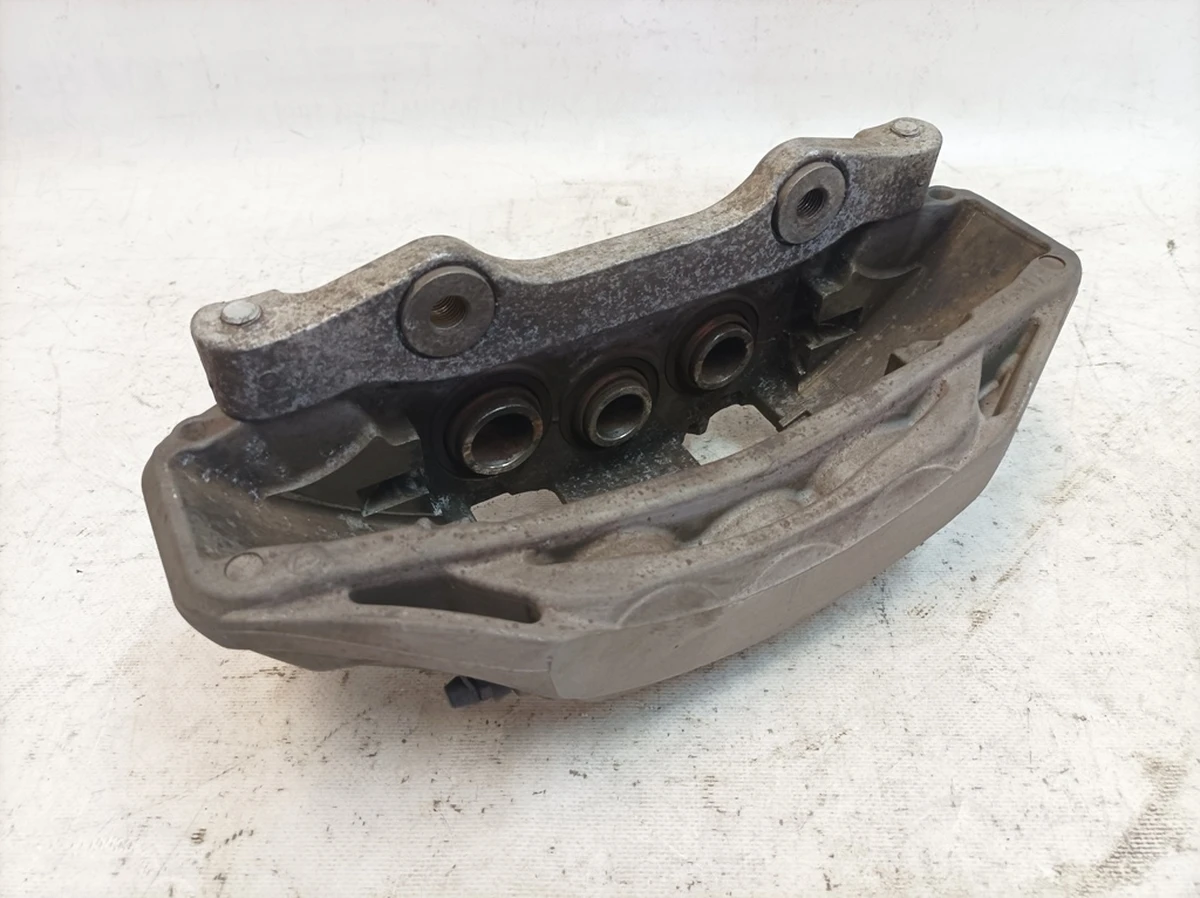 Caliper fixed front right without brake pads with damage Audi Q7 4M0615108H