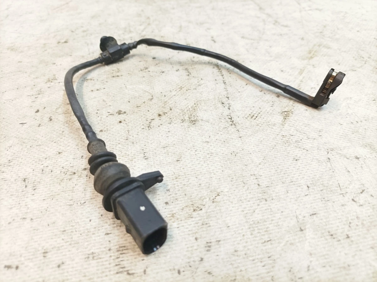 Датчик вказівник зносу томозних колодок задніх Audi Q7 4M0615121P