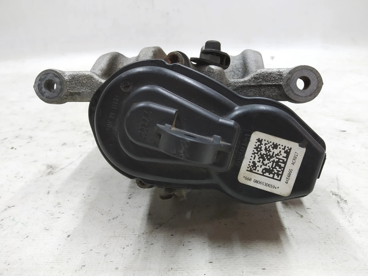 Супорт гальмівний задній правий з електродвигуном, що виконує, без колодок Audi E-tron 4M0615404A