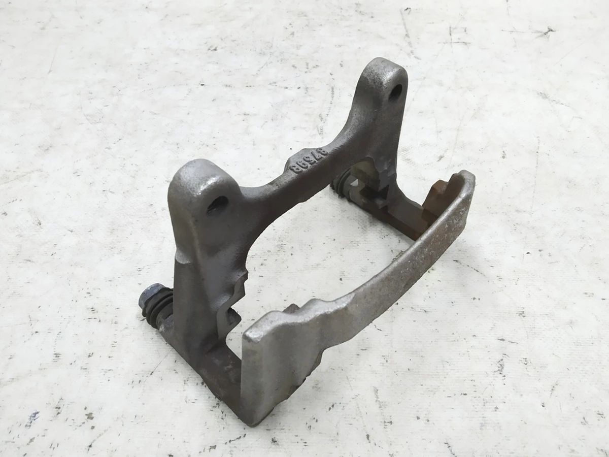 Напрямна колодок стоянкового супорта з напрямними пальцями ліва Audi E-tron 4M0615425