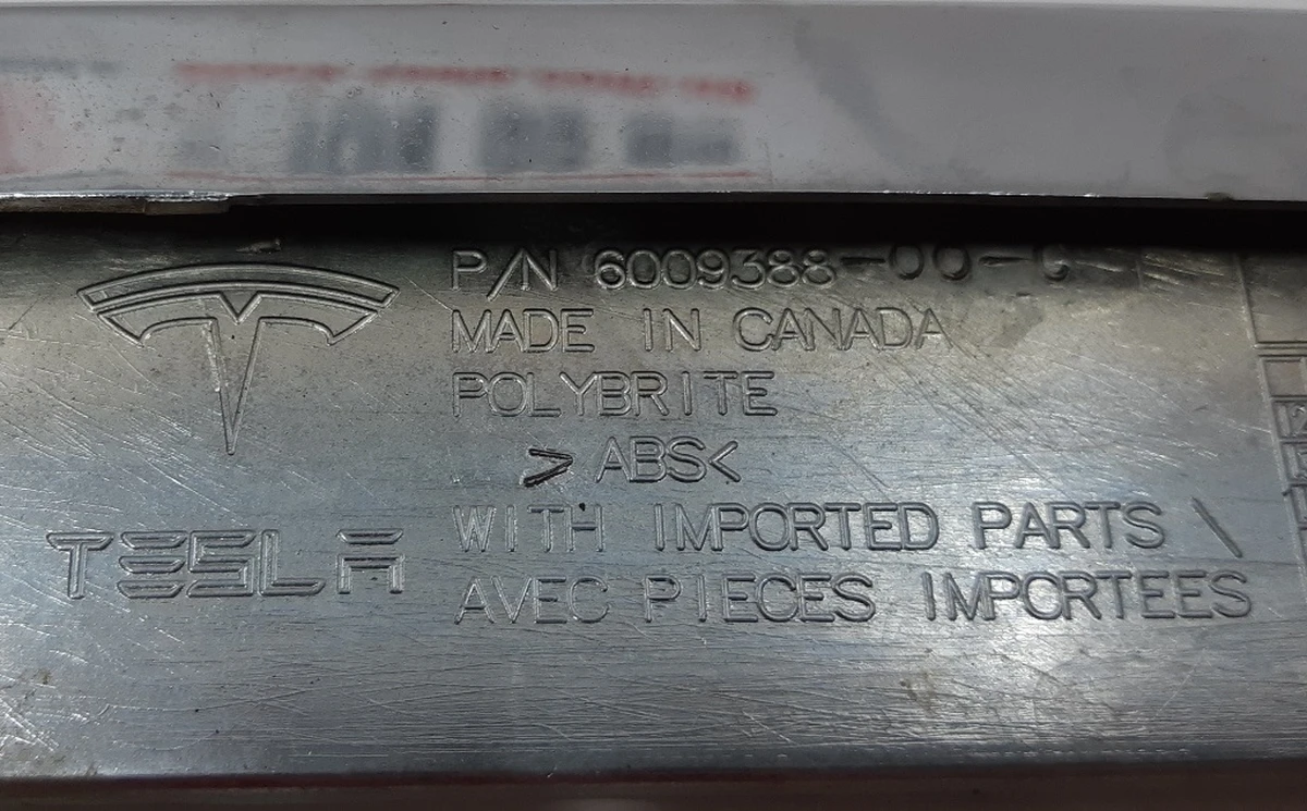 17 Eyelet pad lower left chrome damaged Tesla model S 6009388-00-C