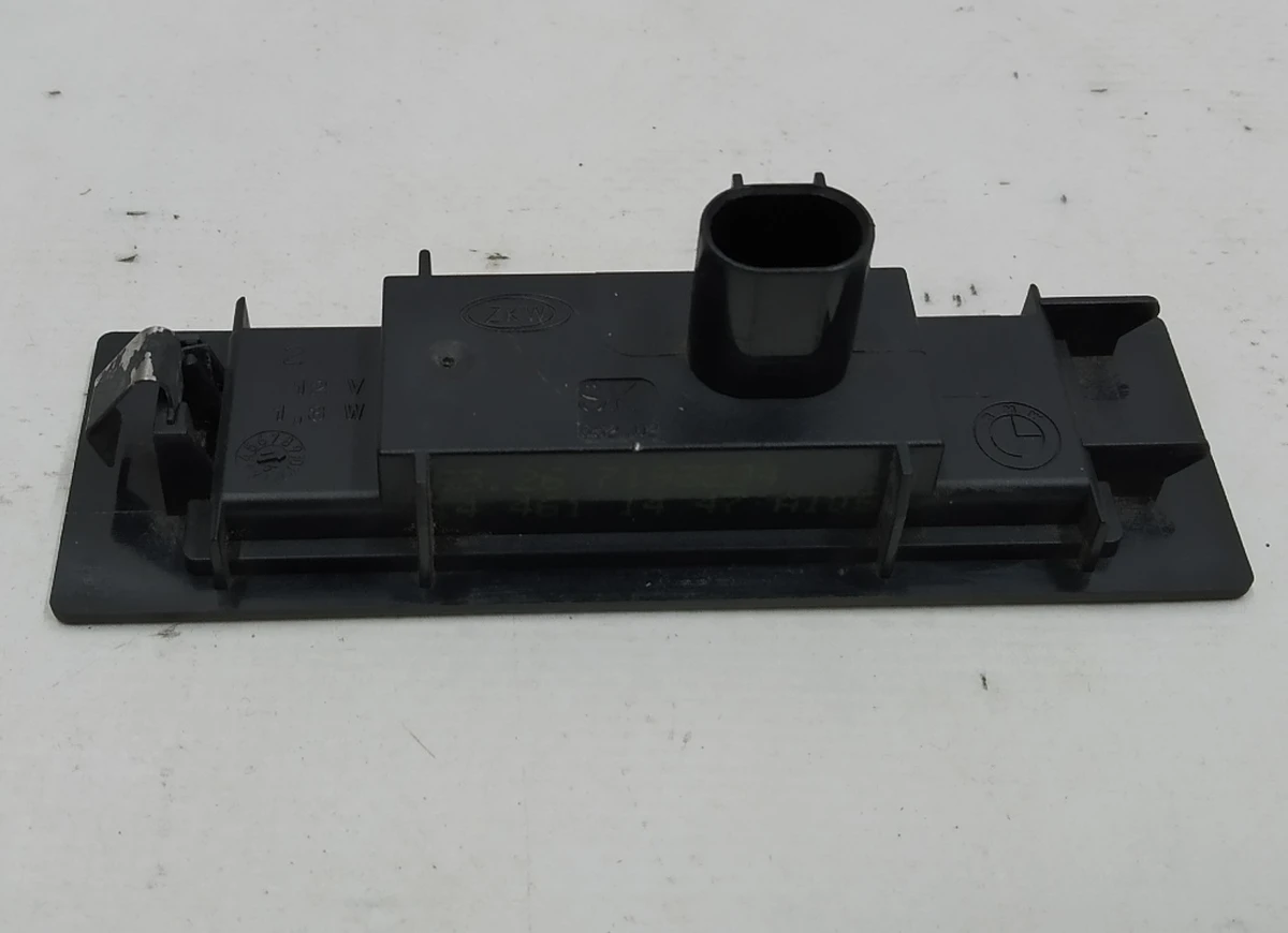 Фонарь подсветки заднего номера BMW i3 63267193294