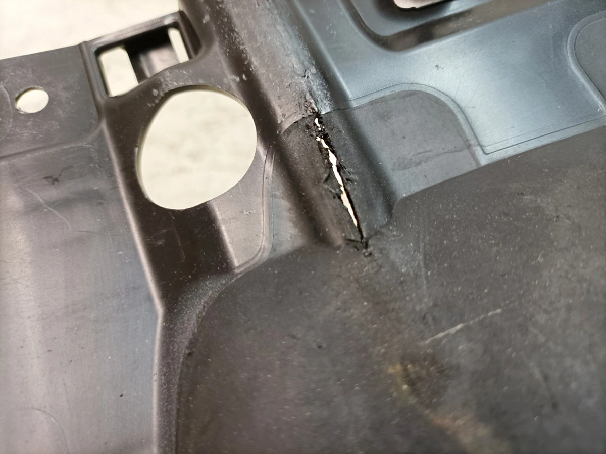 Wheel arch extension (mudguard) right with damage Porsche Taycan 9J1854828A