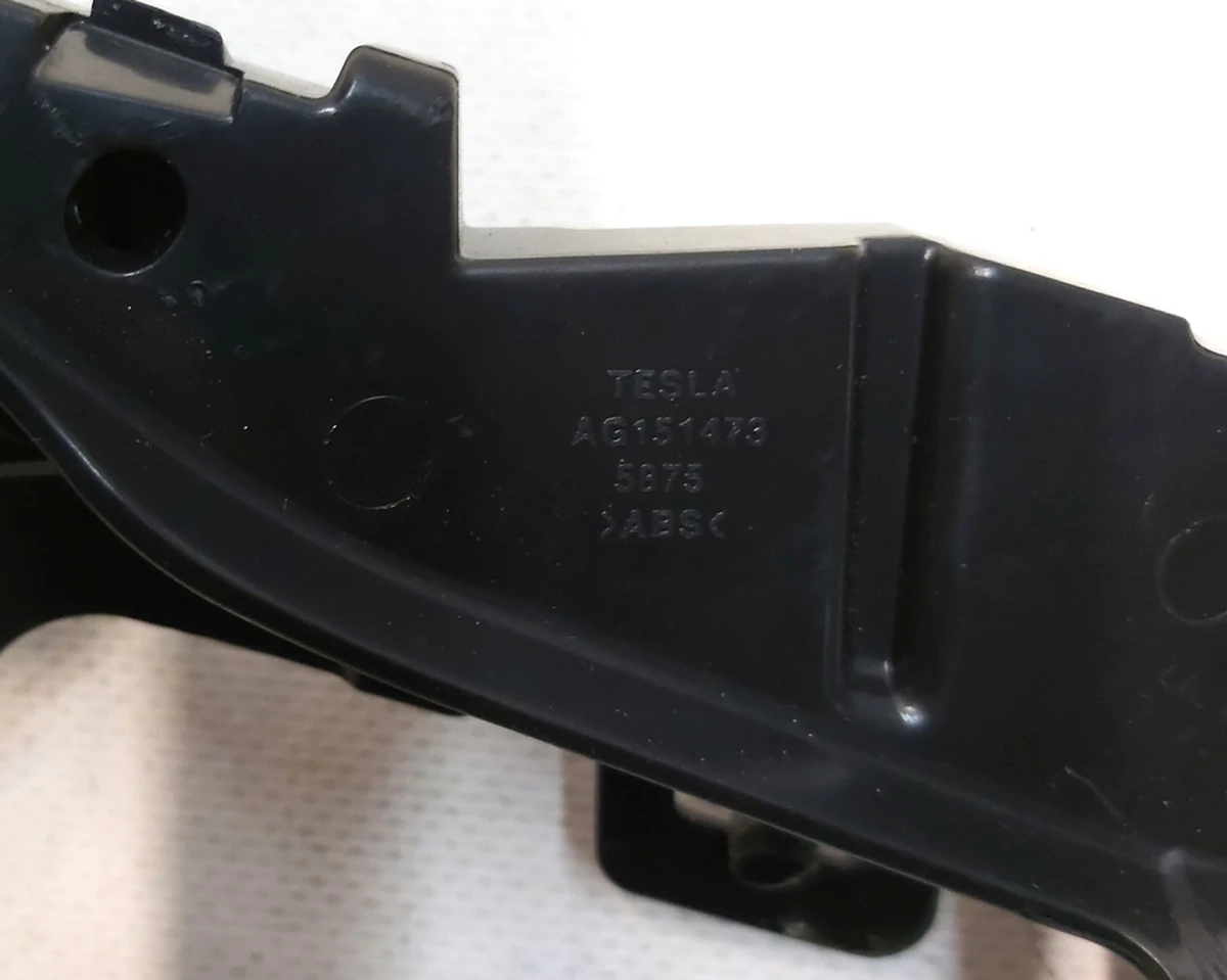 SURROUND, 2ND ROW SEAT,lower front Tesla model X AG151473